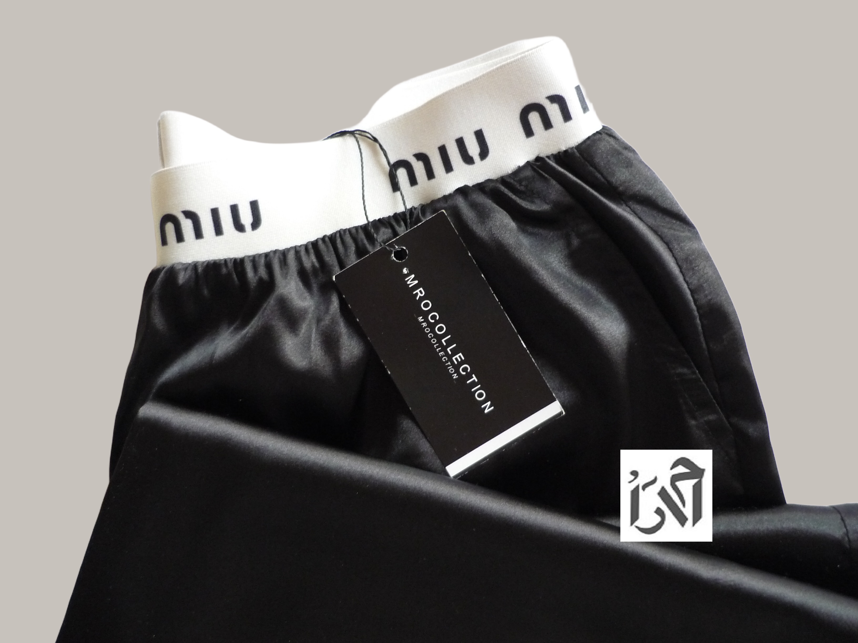 شلوار زنانه ساتن مشکی کمر  میو میو