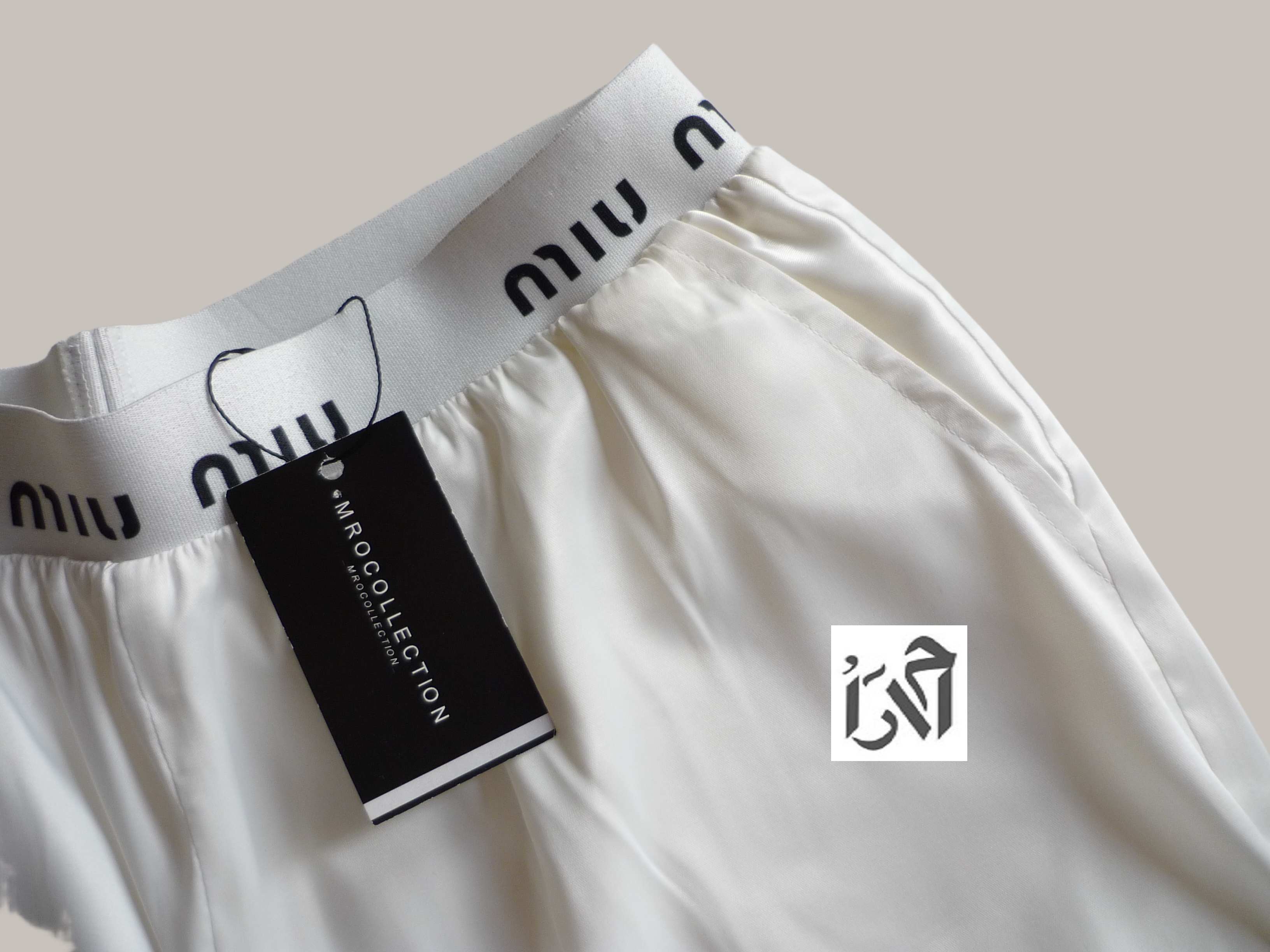 شلوار زنانه ساتن سفید کمر میو میو